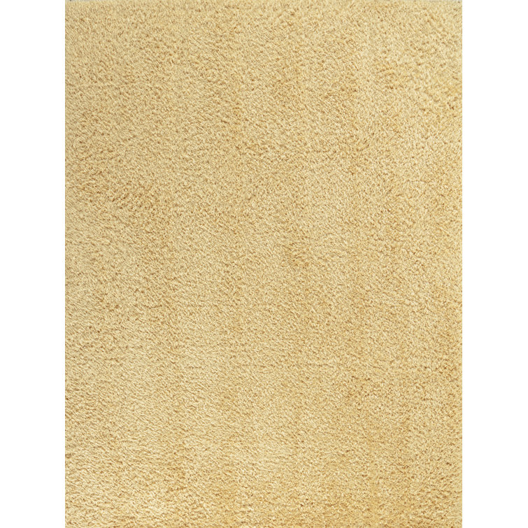 Brayden Studio Astri Solid Colour Mustard Area Rug Wayfair.co.uk